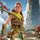 Aloy stands on a beach in front of a bombed out overgrown tower in post apocalypse San Francisco in Horizon Forbidden West.